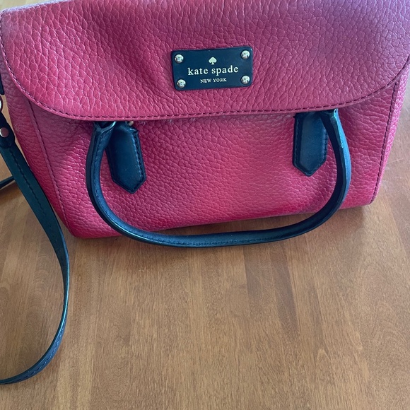 Kate Spade red people leather bag with black trim. - Picture 1 of 3